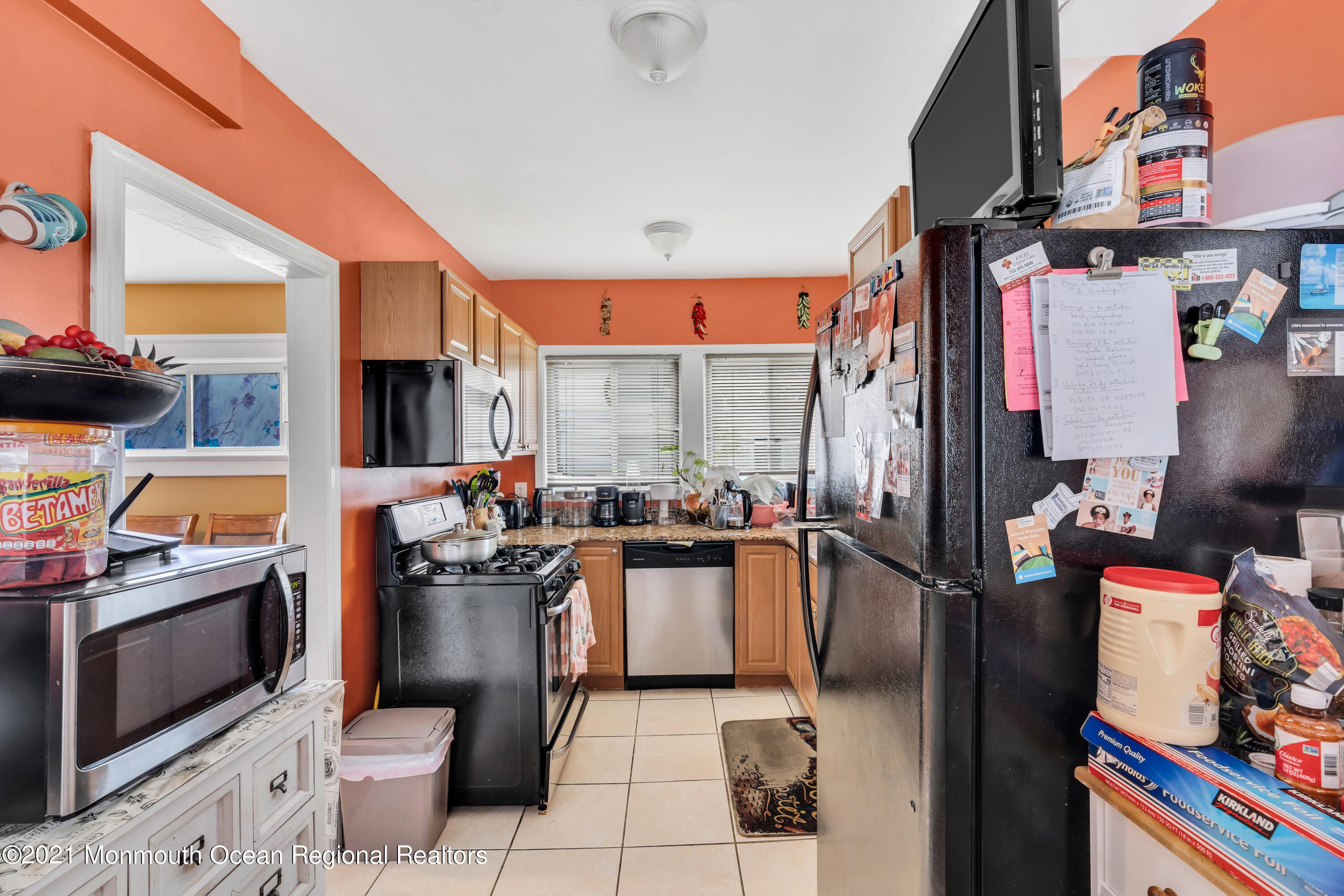 1209 7th Avenue, Unit 1/2 Neptune Township, NJ 07753 - Photo 12 of 19 a kitchen with a sink appliances and cabinets
