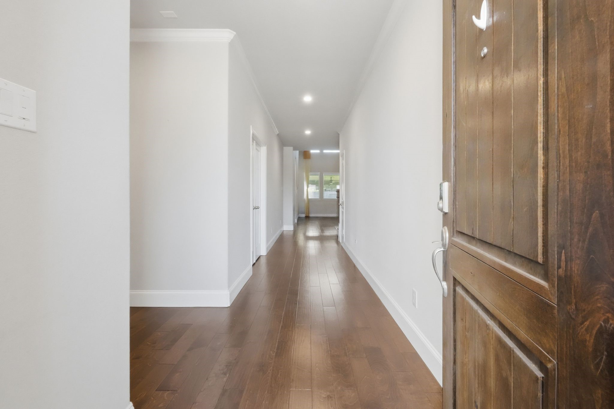 2809 Andante Green Drive Spring, TX 77386 - Photo 3 of 50 a view of a hallway with wooden floor