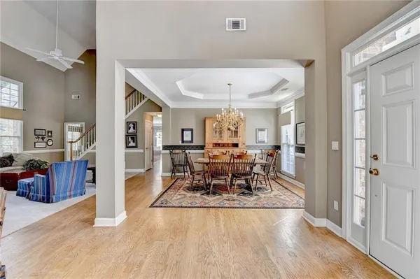 a view of a living room and dining room