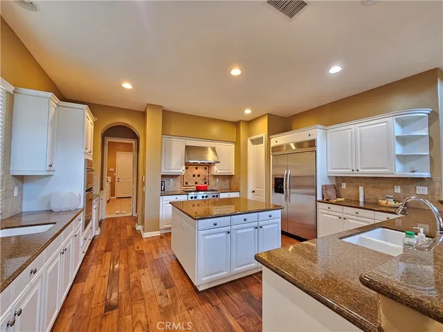 an aerial view of houses with yard