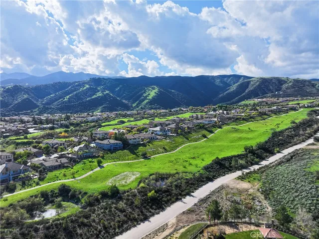a view of a city with mountains in the background