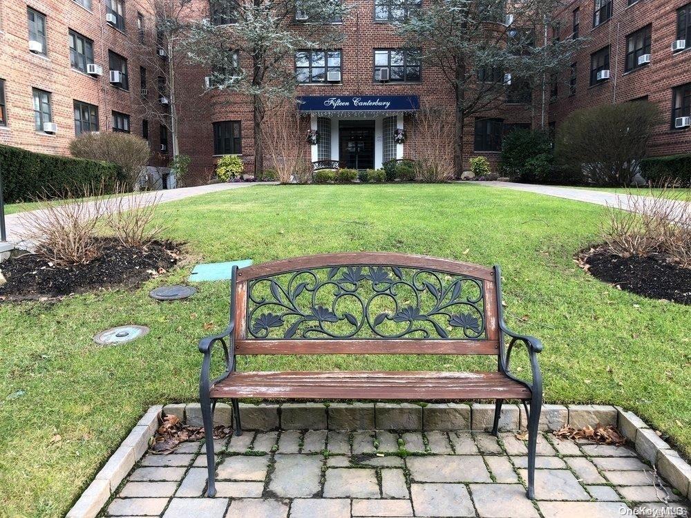 15 Canterbury Road, Unit C13 Great Neck, NY 11021 - Photo 2 of 12 a sign on the side of the building