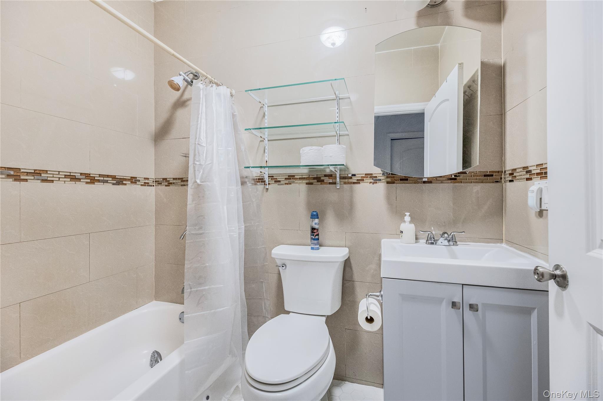 621 Faile Street Bronx, NY 10474 - Photo 15 of 32 a bathroom with a sink toilet and shower