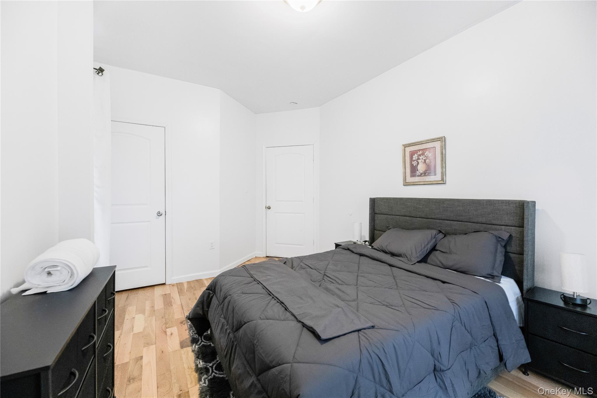 621 Faile Street Bronx, NY 10474 - Photo 20 of 32 a bedroom with a bed and a window