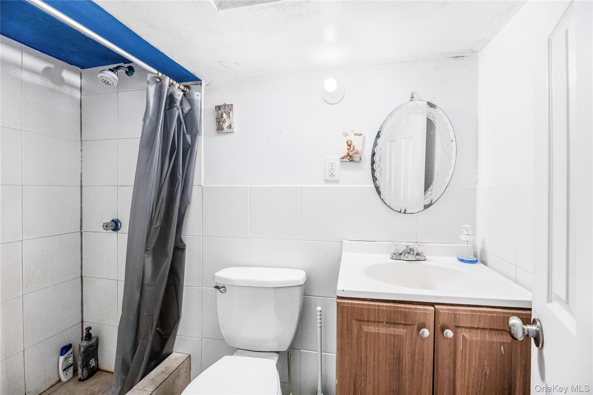 621 Faile Street Bronx, NY 10474 - Photo 8 of 32 a bathroom with a sink toilet and shower