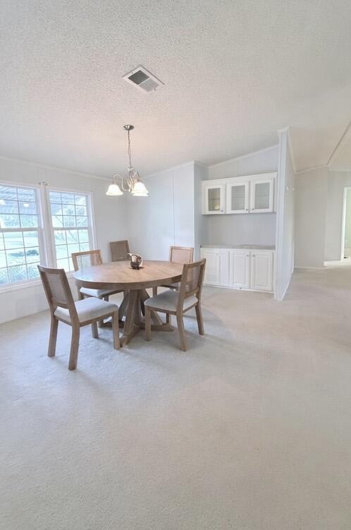 4096 Southwest 9th Way Okeechobee, FL 34974 - Photo 13 of 36 a room with furniture and a chandelier