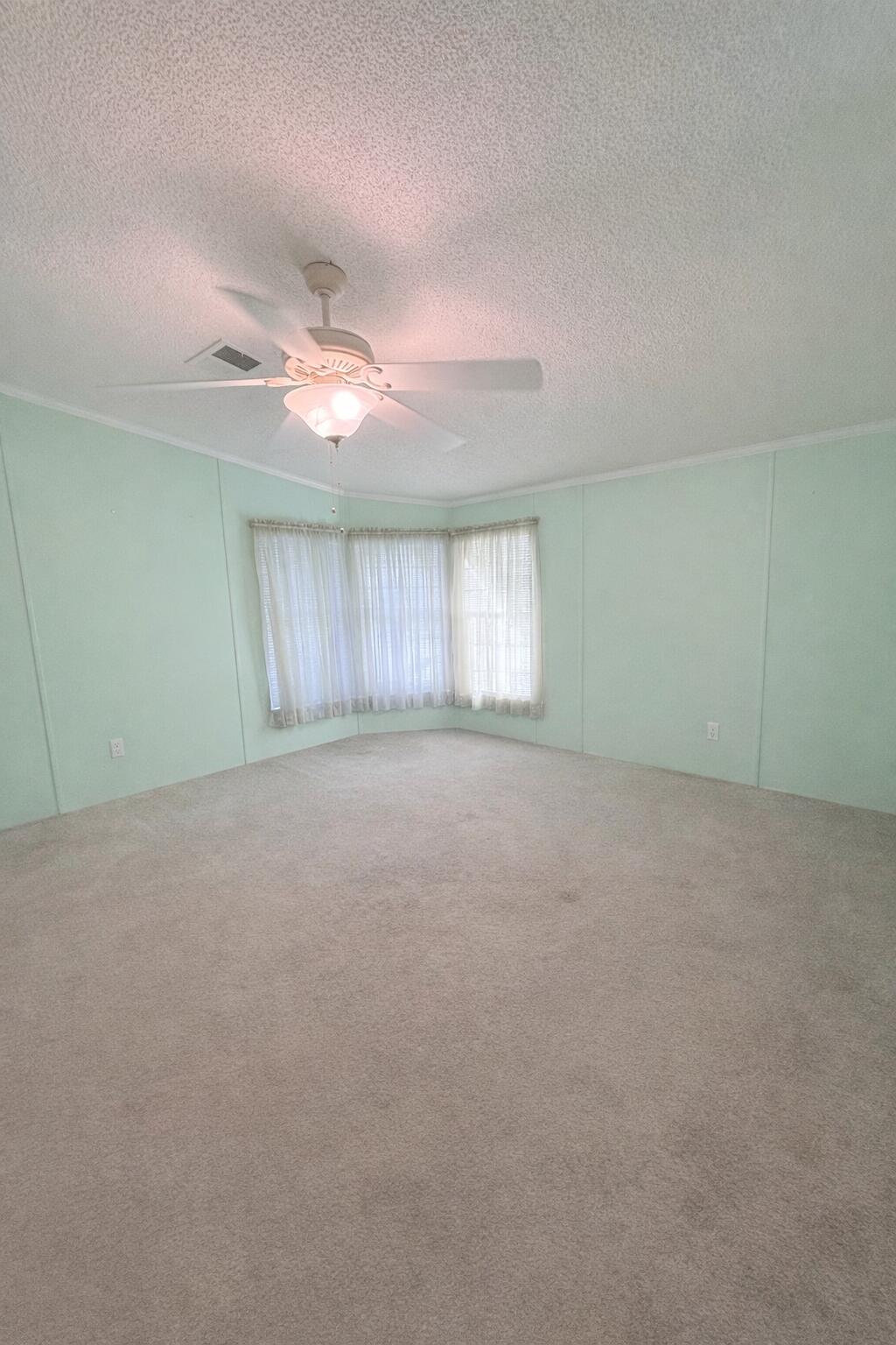 4096 Southwest 9th Way Okeechobee, FL 34974 - Photo 18 of 36 a view of an empty room with a window