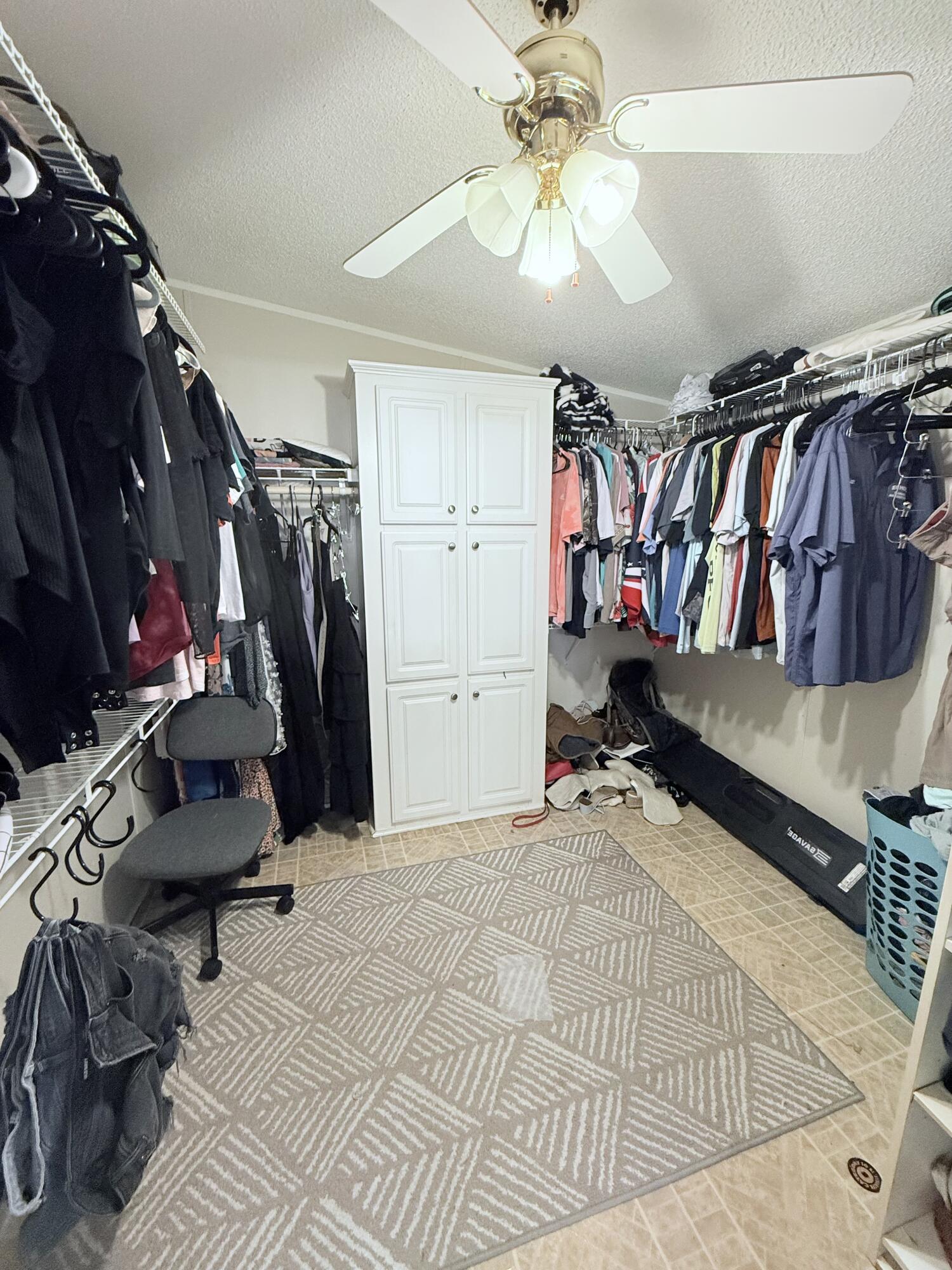 4096 Southwest 9th Way Okeechobee, FL 34974 - Photo 24 of 36 a view of a room with lots of gym equipment