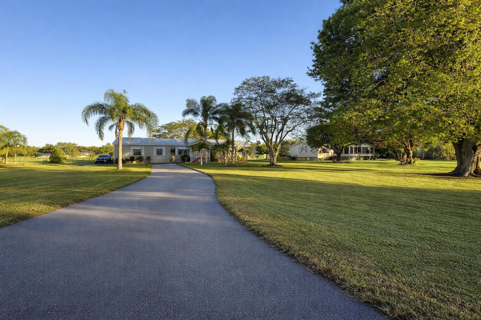 4096 Southwest 9th Way Okeechobee, FL 34974 - Photo 5 of 36 a view of a park with large trees