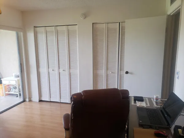 a room with a bed and a window