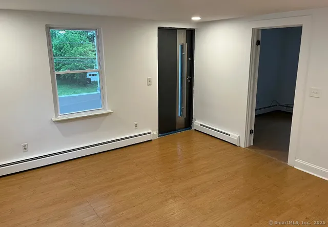 an empty room with window