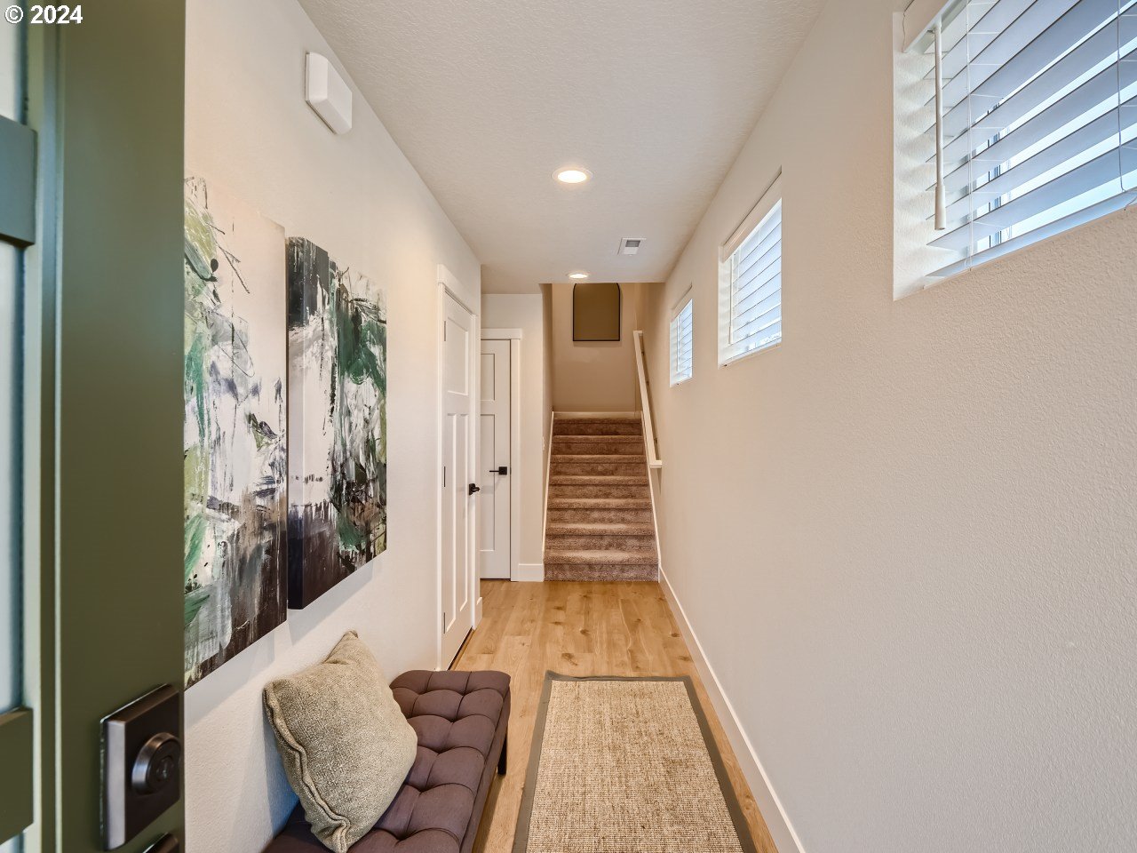 20629 Southwest Boyd Court, Unit 3 Beaverton, OR 97003 - Photo 17 of 46 a view of entryway with furniture and wooden floor