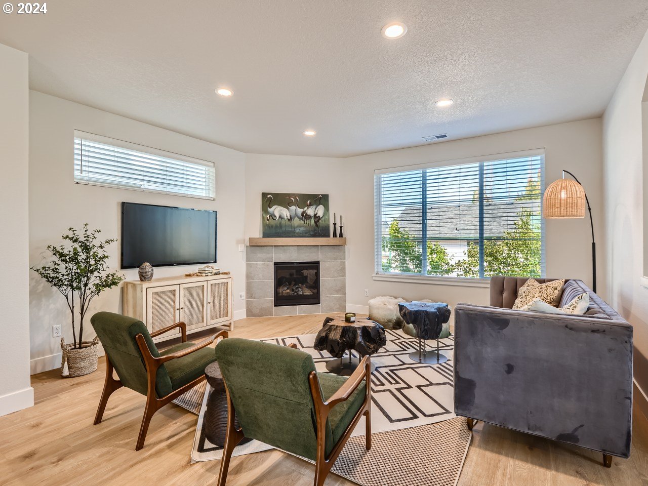20629 Southwest Boyd Court, Unit 3 Beaverton, OR 97003 - Photo 19 of 46 a living room with furniture fireplace and window