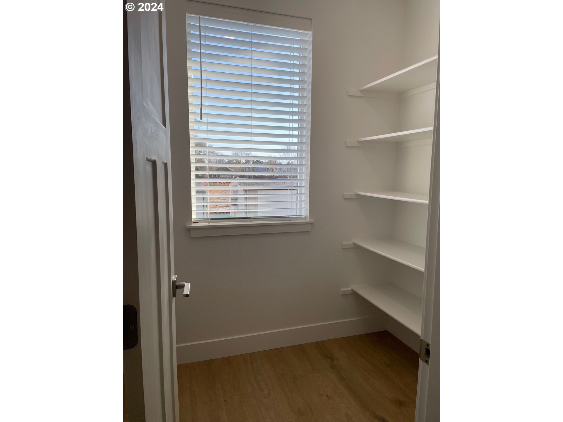 20629 Southwest Boyd Court, Unit 3 Beaverton, OR 97003 - Photo 25 of 46 a view of an empty room with a window