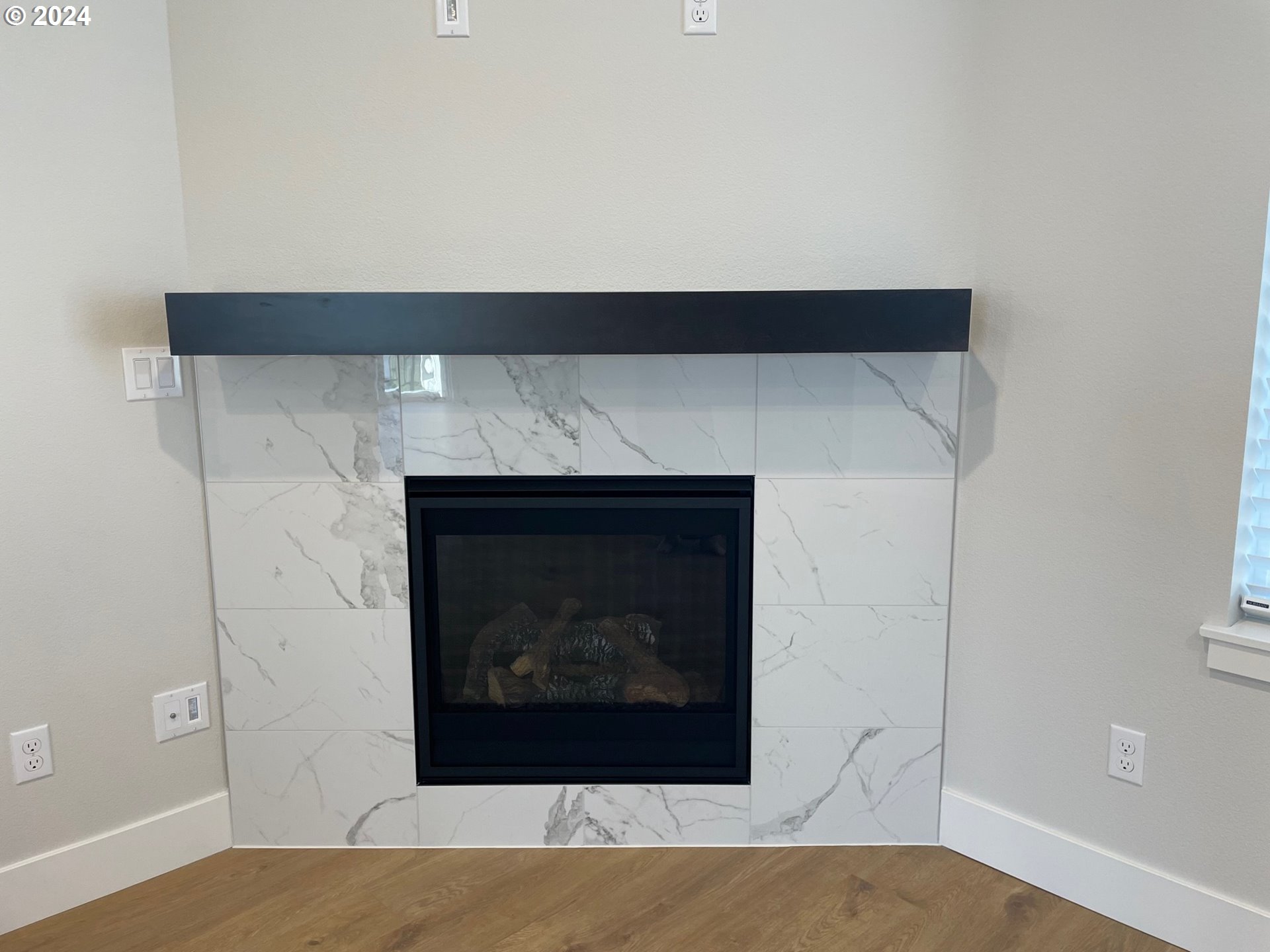 20629 Southwest Boyd Court, Unit 3 Beaverton, OR 97003 - Photo 8 of 46 a room with a fireplace