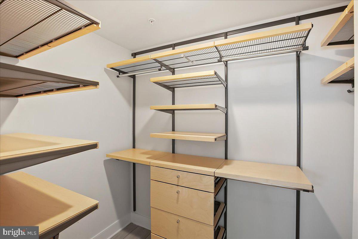 12768 Sunrise Valley Drive Reston, VA 20191 - Photo 21 of 33 a kitchen with a refrigerator and a sink