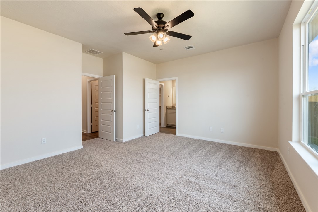 15238 Still Water Mdw Loop Bryan, TX 77845 - Photo 24 of 50 a view of an empty room with a window