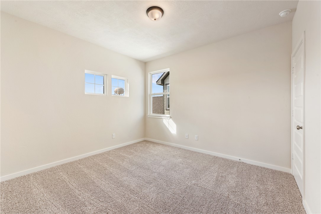 15238 Still Water Mdw Loop Bryan, TX 77845 - Photo 35 of 50 a view of an empty room with a window