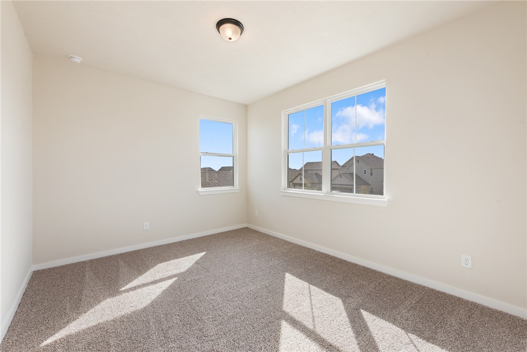 15238 Still Water Mdw Loop Bryan, TX 77845 - Photo 39 of 50 a view of an empty room with a window