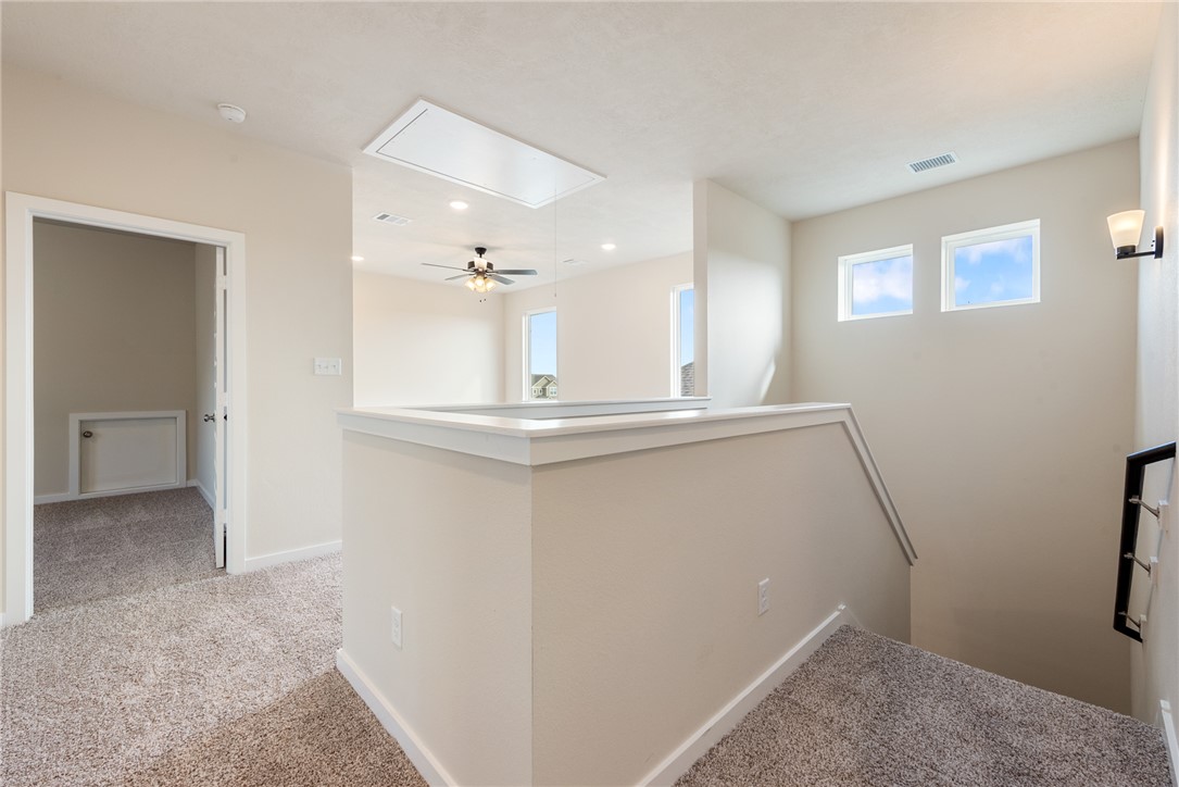15238 Still Water Mdw Loop Bryan, TX 77845 - Photo 41 of 50 a view of a kitchen from the hallway