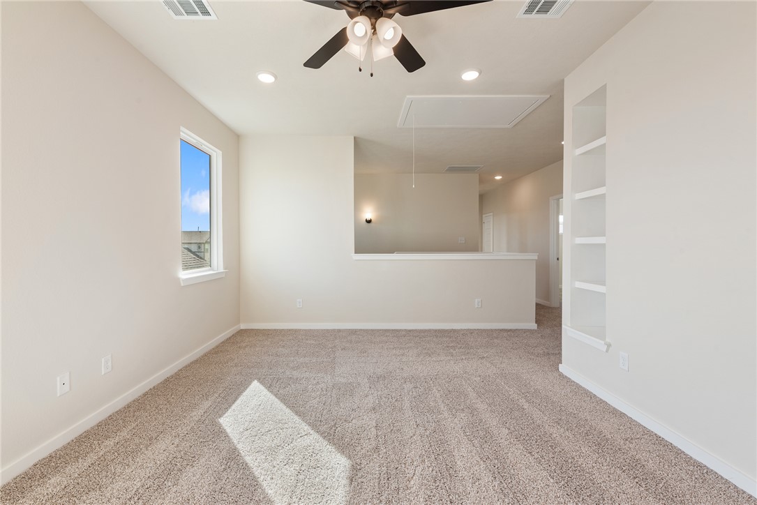15238 Still Water Mdw Loop Bryan, TX 77845 - Photo 47 of 50 wooden floor in an empty room with a window