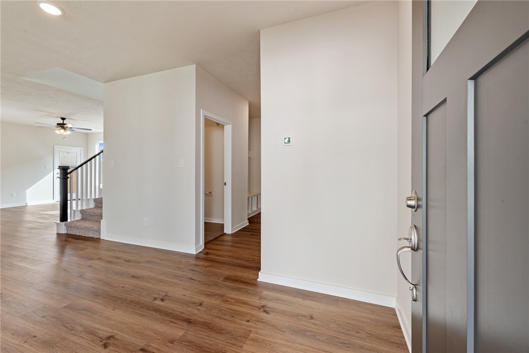 15238 Still Water Mdw Loop Bryan, TX 77845 - Photo 7 of 50 a view of entryway with wooden floor