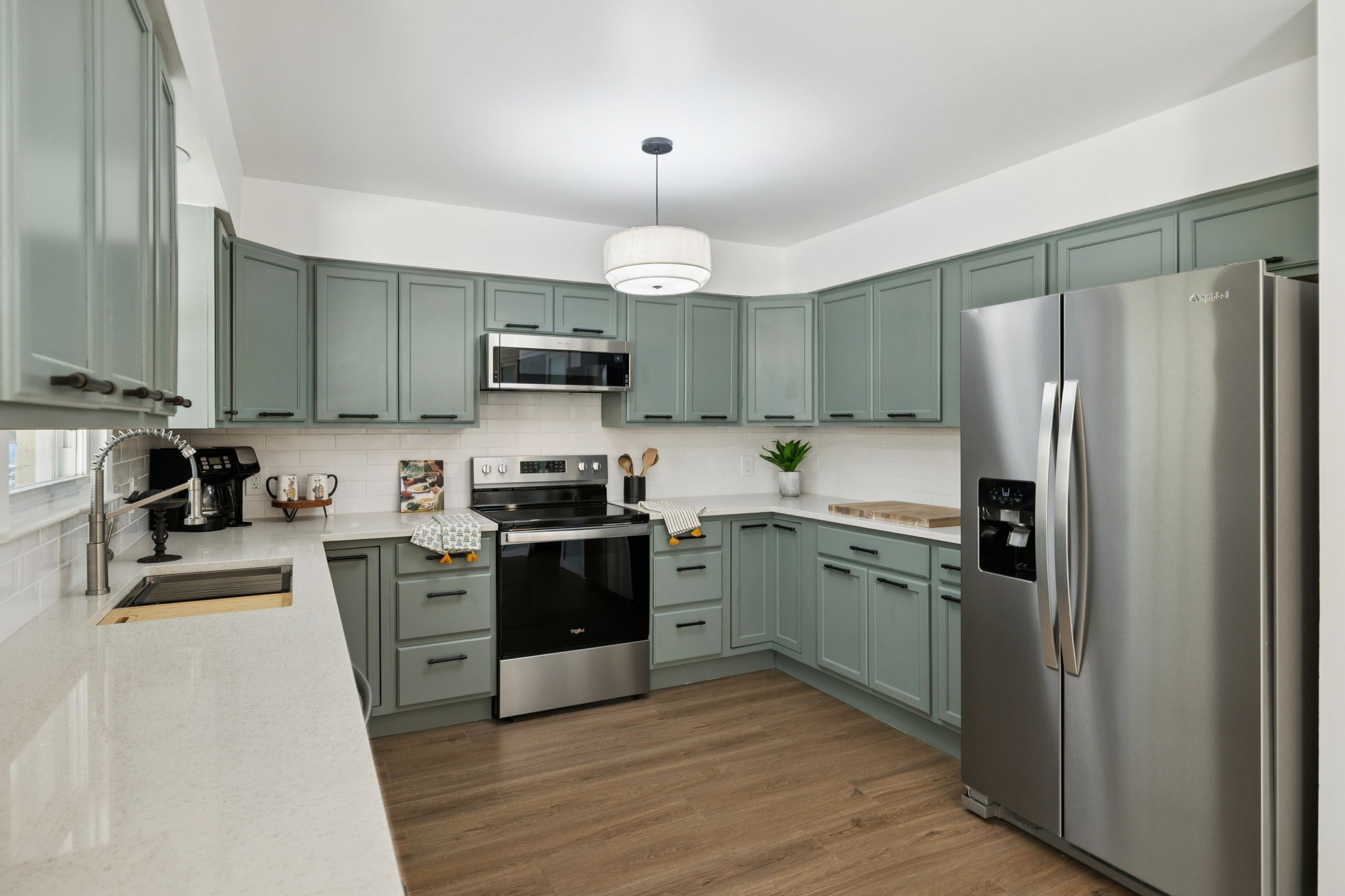3708 Anderson Road Nashville, TN 37217 - Photo 40 of 75 a kitchen with stainless steel appliances granite countertop a refrigerator a stove top oven a sink and dishwasher