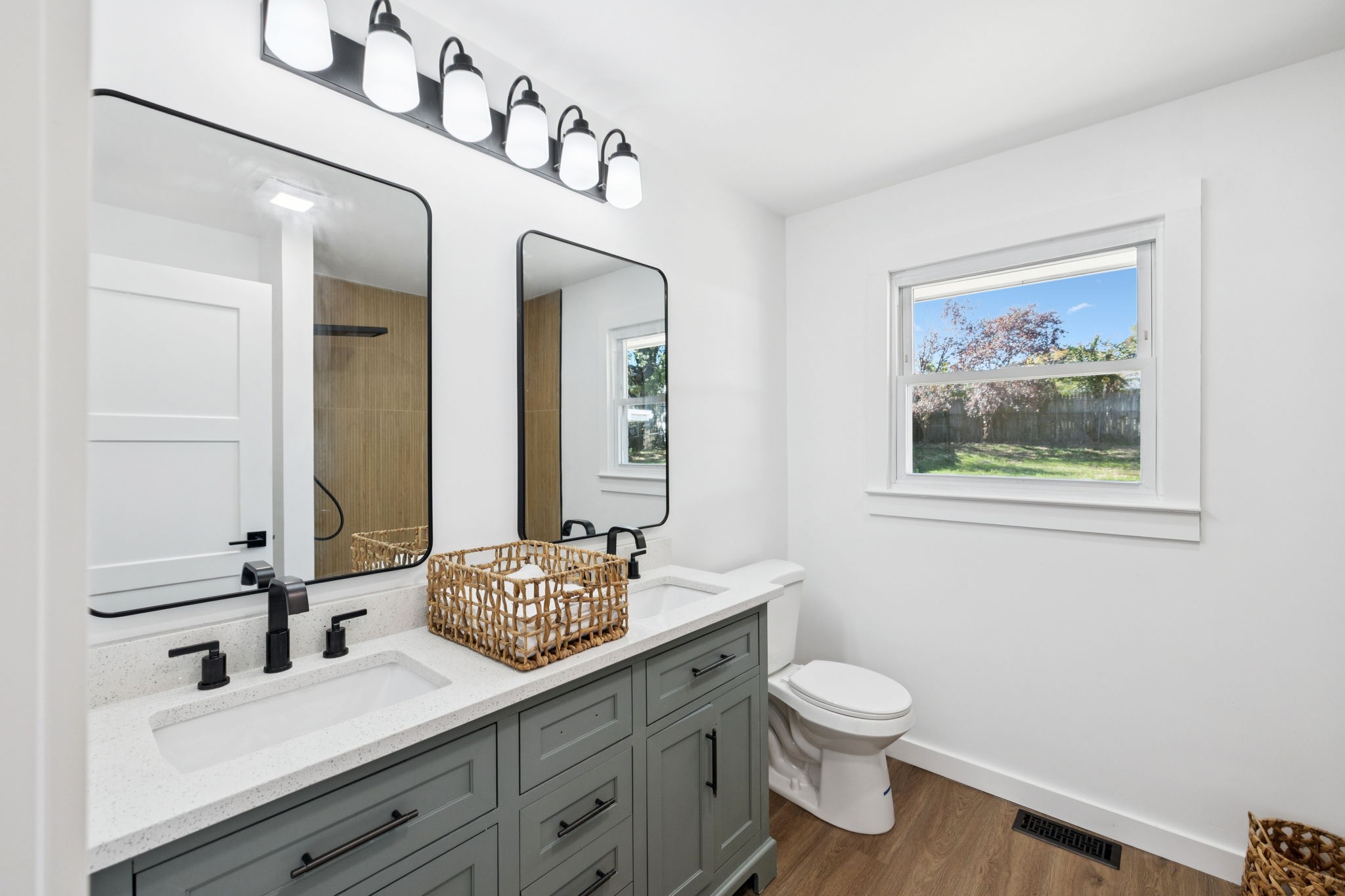 3708 Anderson Road Nashville, TN 37217 - Photo 48 of 75 a bathroom with a toilet a sink and mirror