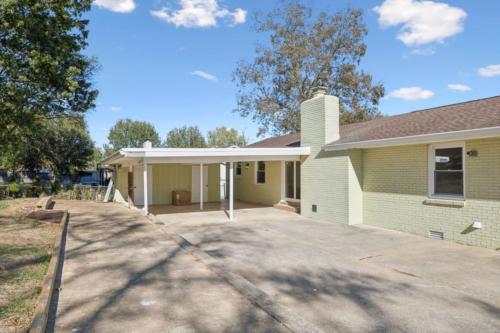 3708 Anderson Road Nashville, TN 37217 - Photo 59 of 75 a front view of a house with a yard and garage