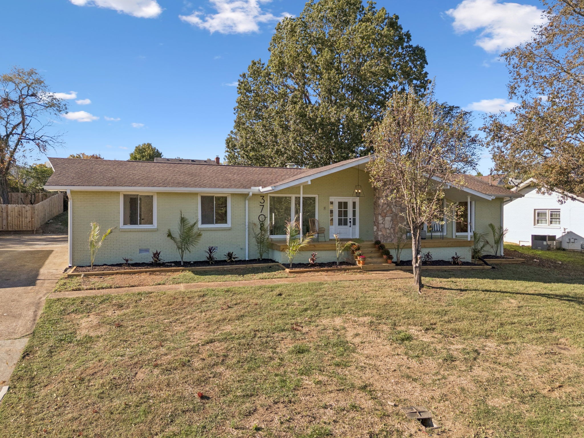 3708 Anderson Road Nashville, TN 37217 - Photo 10 of 75 a house that has a tree in front of it