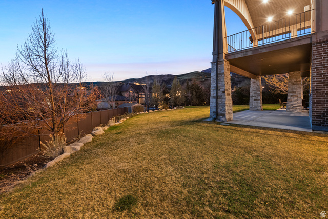 1205 North Elk Rdg Lane, Unit 202 Alpine, UT 84004 - Photo 83 of 88 Spacious rear yard with a sloped lawn and mature landscaping