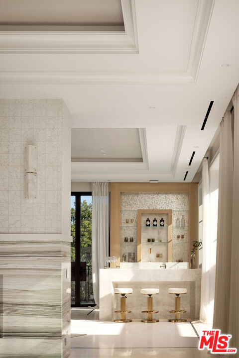 721 North Bonhill Road Los Angeles, CA 90049 - Photo 11 of 64 a bathroom with a sink mirror and vanity