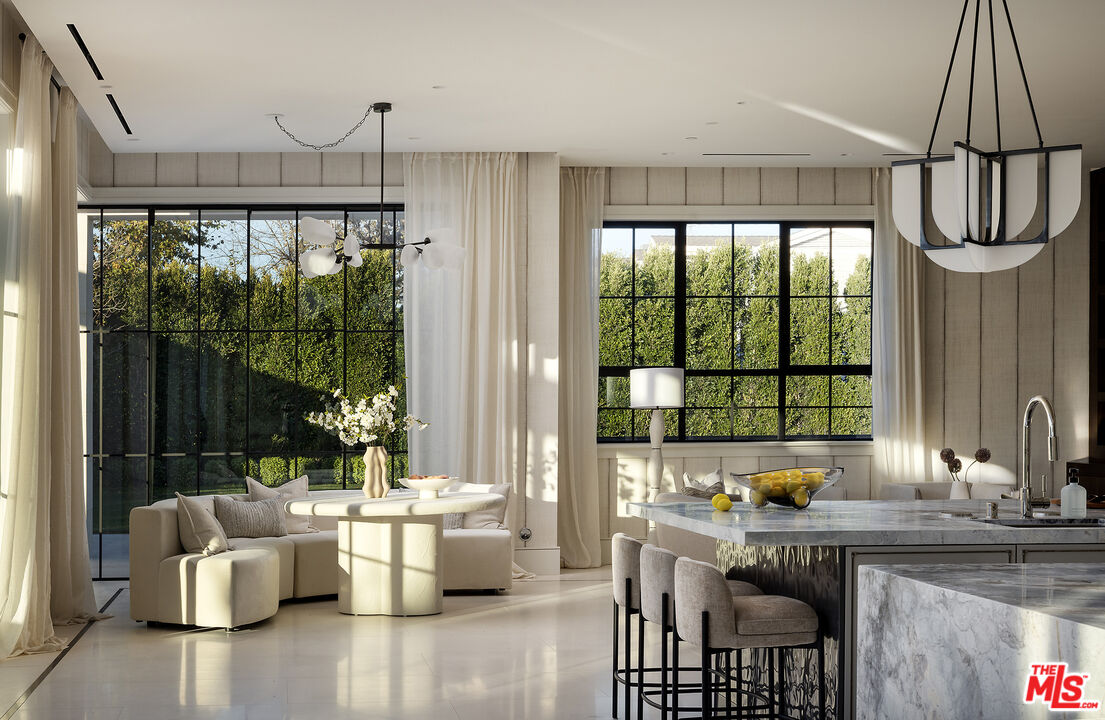 721 North Bonhill Road Los Angeles, CA 90049 - Photo 14 of 64 a living room with furniture and a large window