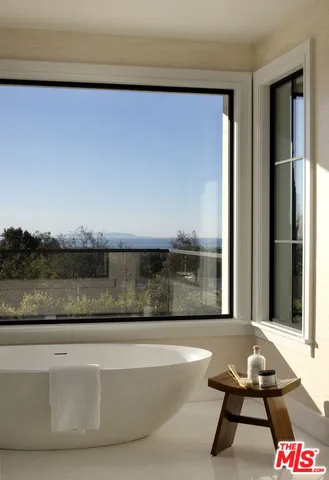 a view of a balcony with city view