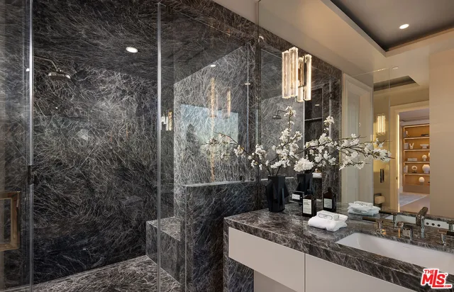 a view of a patio with couches and chairs with potted plants