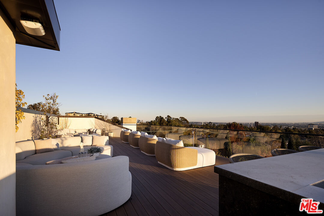 721 North Bonhill Road Los Angeles, CA 90049 - Photo 34 of 64 a view of a balcony with city view