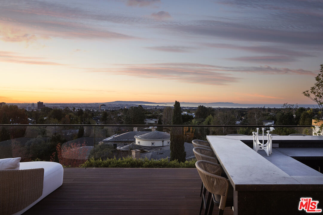 721 North Bonhill Road Los Angeles, CA 90049 - Photo 35 of 64 a view of a terrace with furniture