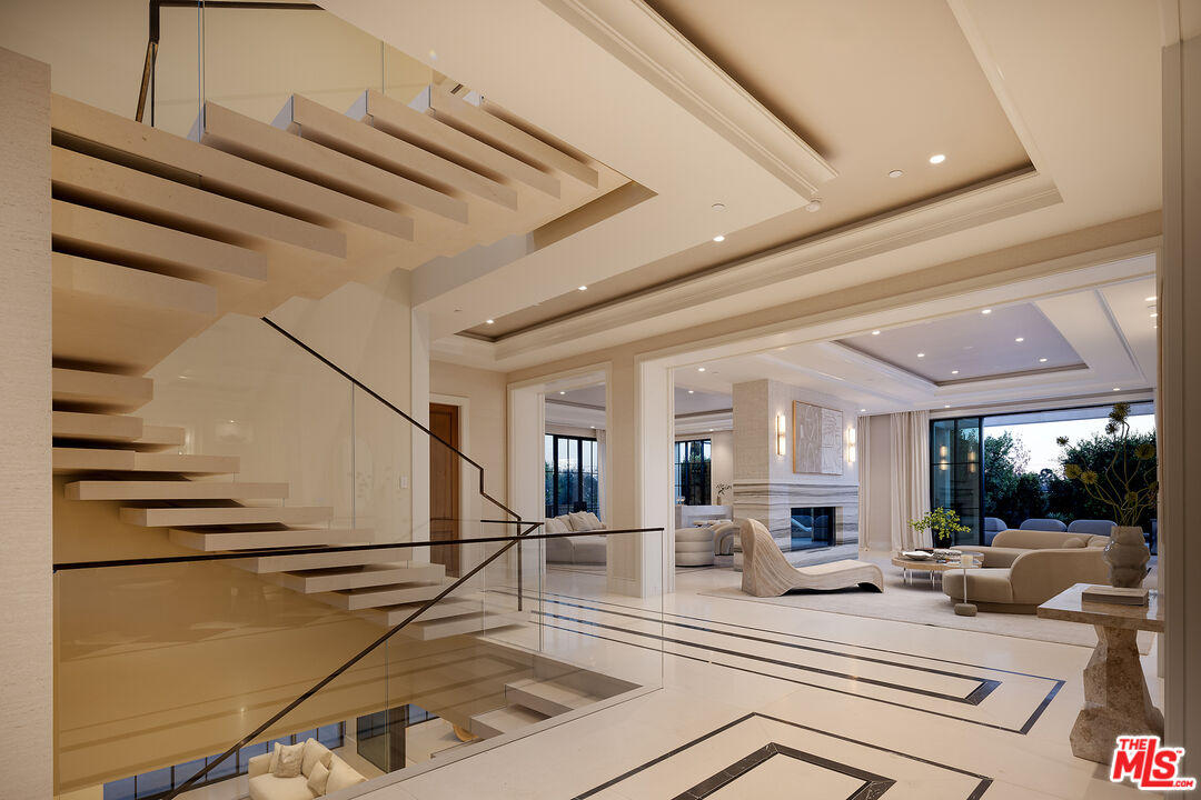 721 North Bonhill Road Los Angeles, CA 90049 - Photo 4 of 64 a view of a living room and entryway