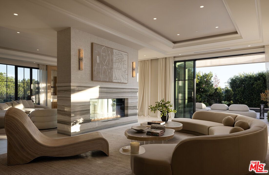 721 North Bonhill Road Los Angeles, CA 90049 - Photo 5 of 64 a living room with furniture and a large window