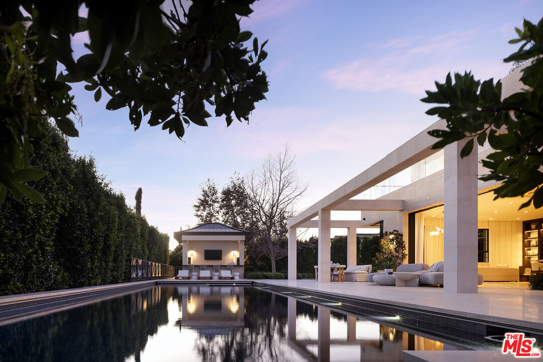721 North Bonhill Road Los Angeles, CA 90049 - Photo 60 of 64 a front view of a house with a ocean view