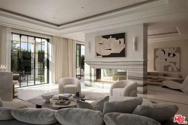 a bathroom with a sink mirror and vanity
