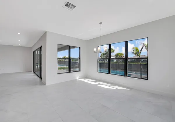 an empty room with windows