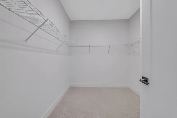 a view of a room with racks on the wall
