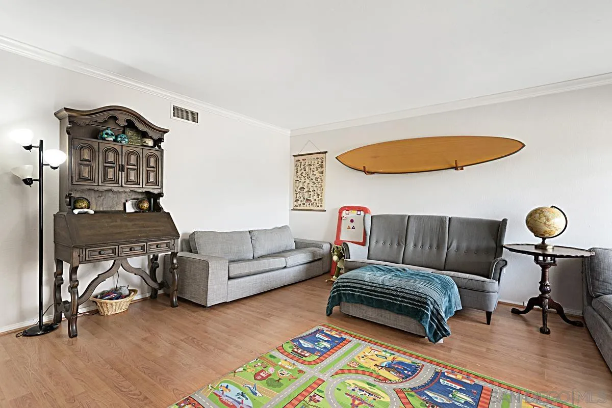 13876 Midland Road Poway, CA 92064 - Photo 7 of 32 a living room with furniture and a wooden floor