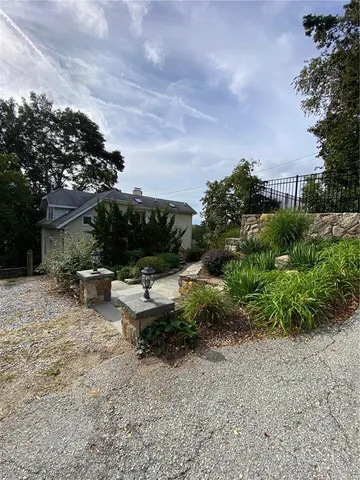 a view of a house with porch and wooden floor