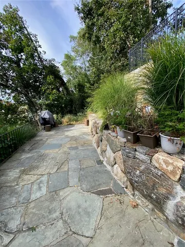 a kitchen with a refrigerator and a stove