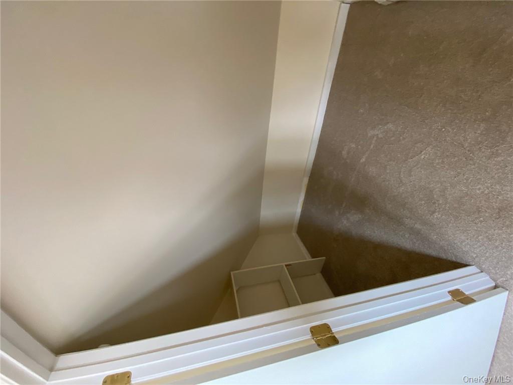49 Croton Point Avenue, Unit C Croton-on-Hudson, NY 10520 - Photo 8 of 17 an empty room with stairs