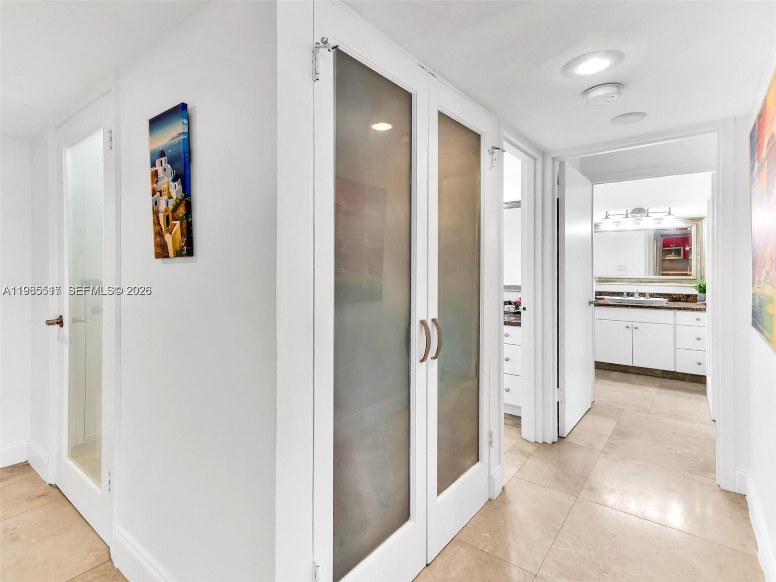 100 Lincoln Road, Unit 308 Miami Beach, FL 33139 - Photo 7 of 11 a view of a kitchen with a refrigerator and a stove top oven