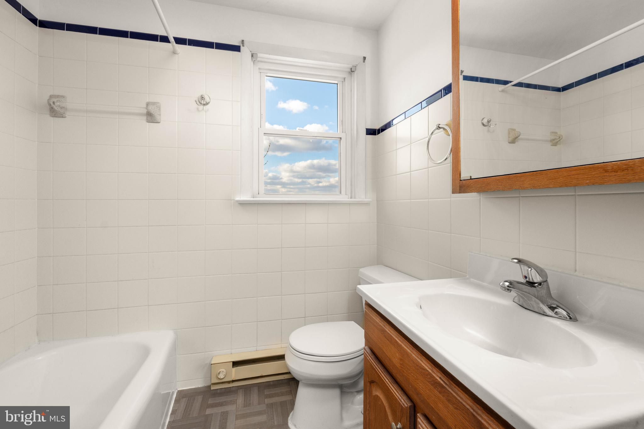 561 Georgetown Road Ronks, PA 17572 - Photo 13 of 34 a bathroom with a sink a toilet and shower