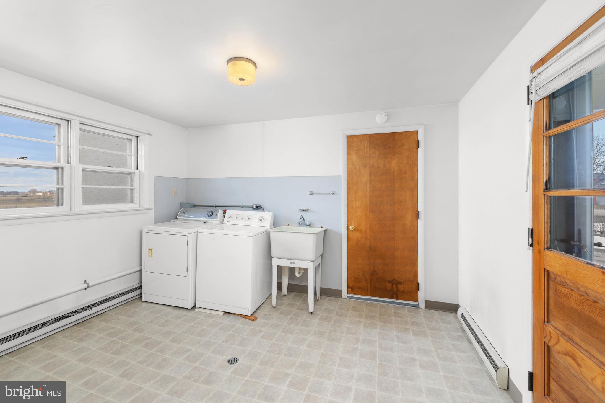 561 Georgetown Road Ronks, PA 17572 - Photo 17 of 34 a utility room with dryer and washer